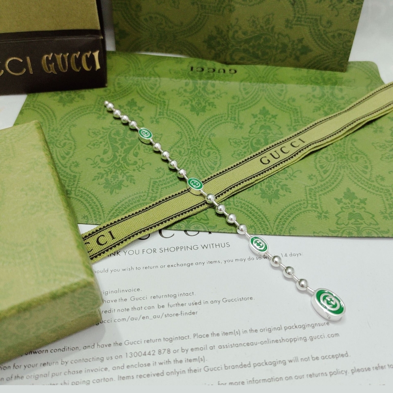 G*u*i bracelets
